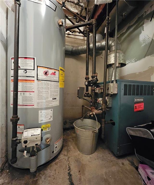 utilities featuring water heater and a heating unit