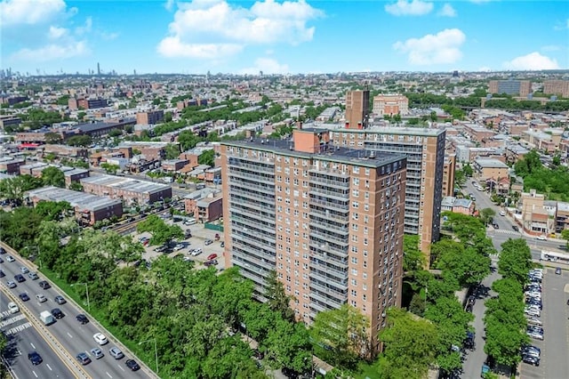 drone / aerial view featuring a city view