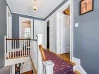 corridor with crown molding