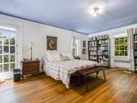 bedroom featuring wood-type flooring