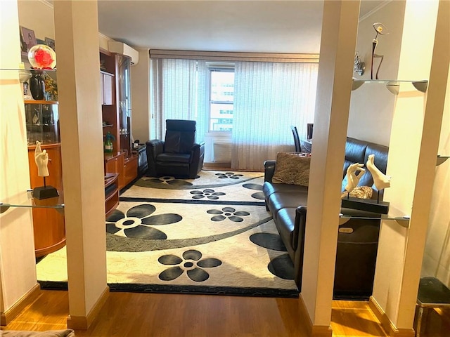 interior space featuring light hardwood / wood-style floors and a wall mounted AC