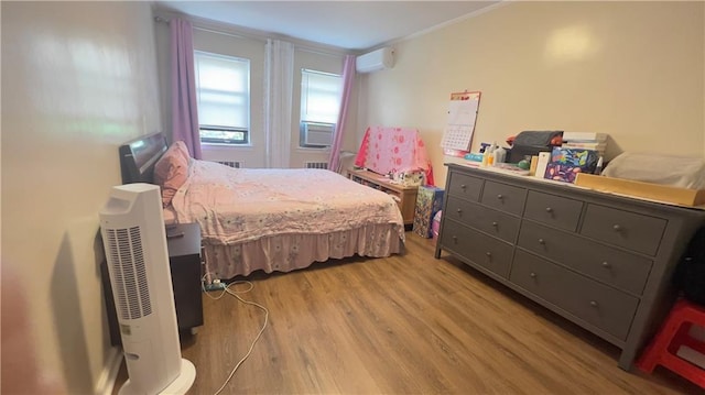 1853 W 4th St, Brooklyn, NY 11223 - bedroom featuring a wall mounted air conditioner, light wood-type flooring, and ornamental molding