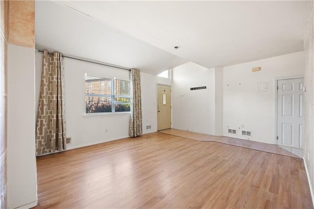 unfurnished room featuring light wood-type flooring