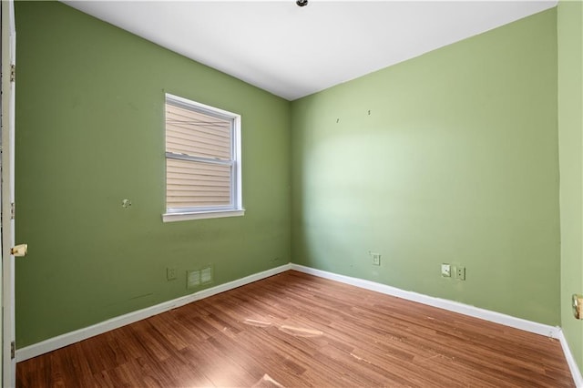 empty room with light wood-type flooring