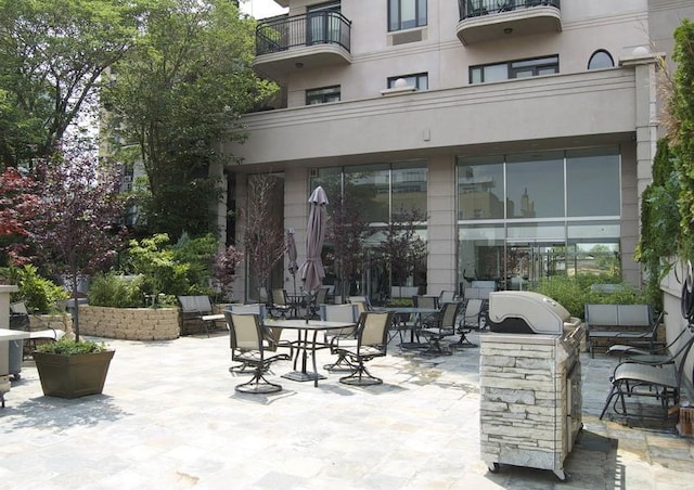 view of patio / terrace featuring a balcony and area for grilling