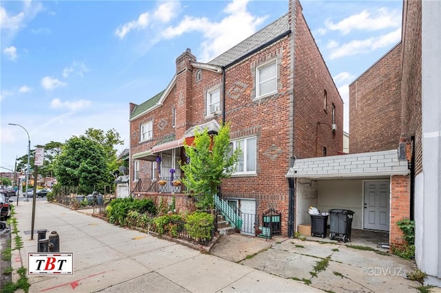 exterior space with brick siding