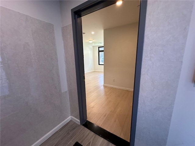 207 Bay 35th St Unit 1A, Brooklyn, NY 11214 - spare room featuring wood finished floors and baseboards