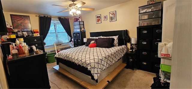 bedroom with carpet and a ceiling fan