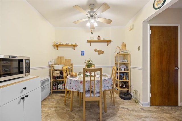 dining room featuring a ceiling fan