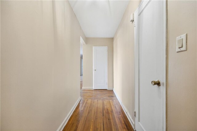 hallway featuring hardwood / wood-style floors