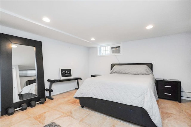 bedroom featuring a wall mounted air conditioner