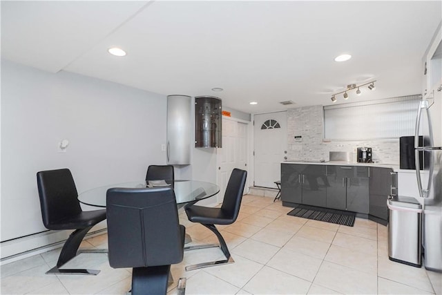 dining room with light tile patterned flooring