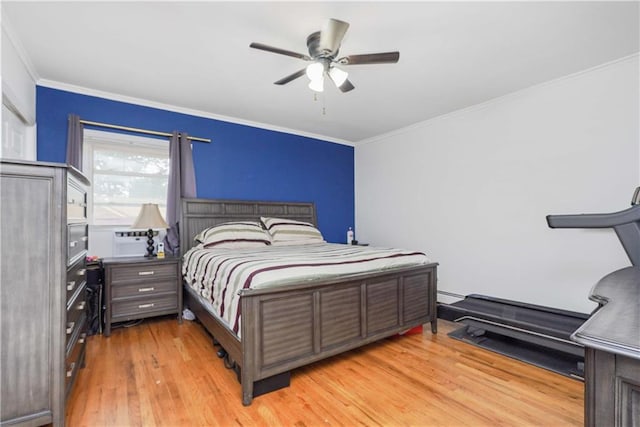 bedroom with ceiling fan, light hardwood / wood-style flooring, and ornamental molding