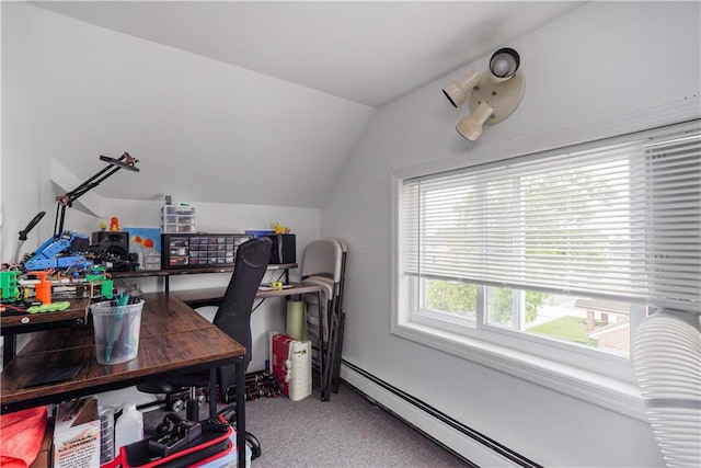 office with carpet floors, vaulted ceiling, and a baseboard heating unit