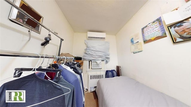 1046 E 32nd St, Brooklyn, NY 11210 - bedroom featuring radiator, a wall unit AC, and cooling unit