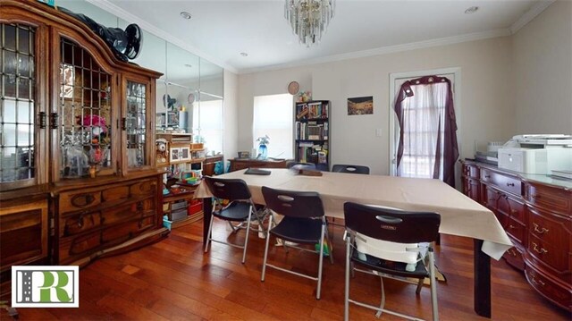 1046 E 32nd St, Brooklyn, NY 11210 - dining area with hardwood / wood-style floors, crown molding, and a chandelier