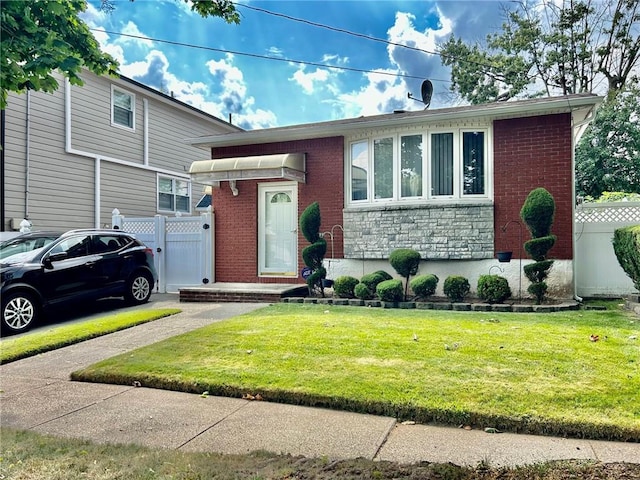 view of front of home with a front yard