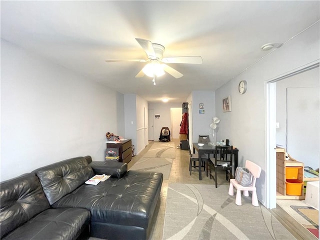 living room featuring ceiling fan