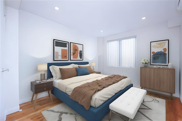 bedroom featuring light hardwood / wood-style floors