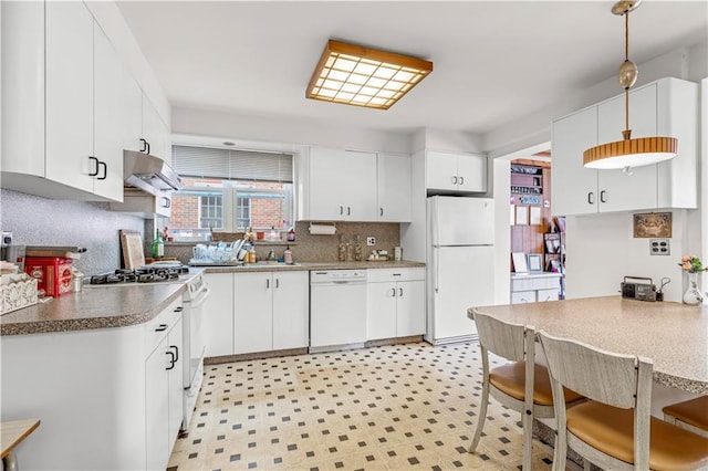 kitchen featuring pendant lighting, white appliances, sink, white cabinetry, and extractor fan