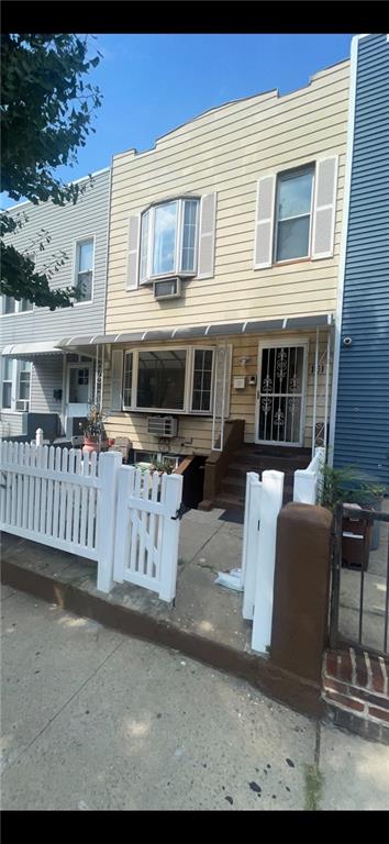 view of property with a porch