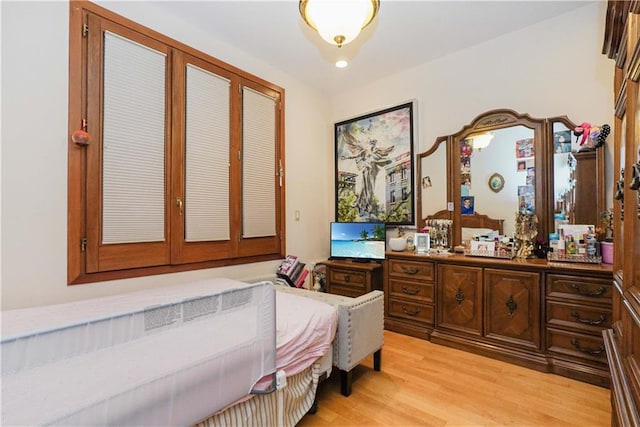 bedroom featuring light hardwood / wood-style floors