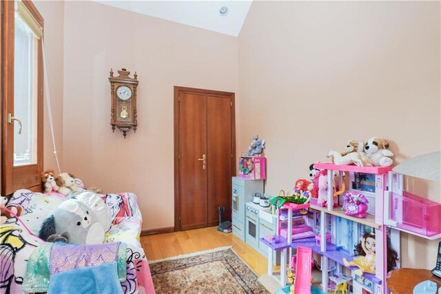 bedroom with light hardwood / wood-style floors