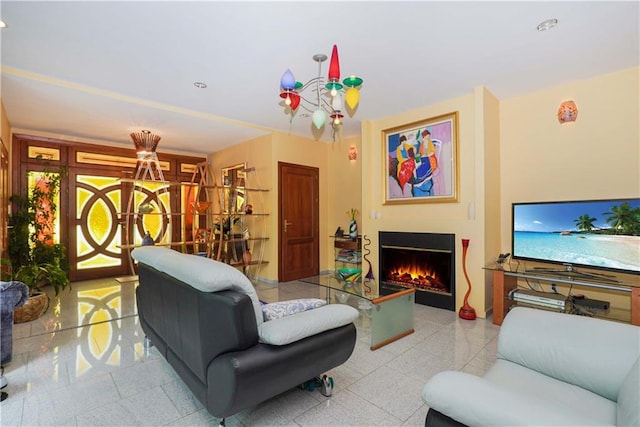 living room with an inviting chandelier