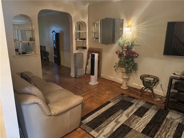 living room featuring parquet floors and ornamental molding