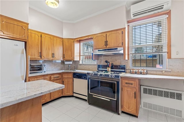 7913 20th Ave, Brooklyn, NY 11214 - kitchen with white appliances, an AC wall unit, radiator, under cabinet range hood, and brown cabinets