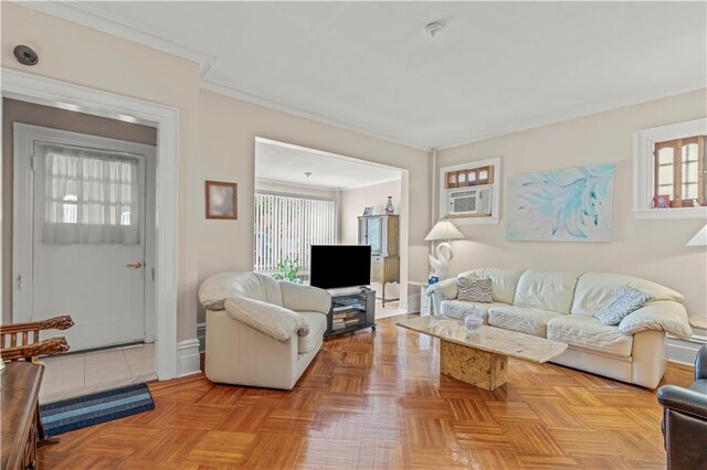 living room featuring light parquet flooring and crown molding