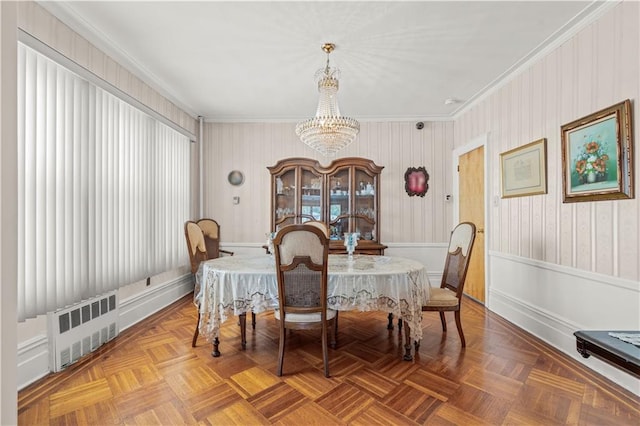 7913 20th Ave, Brooklyn, NY 11214 - dining area featuring radiator, crown molding, a chandelier, and baseboards