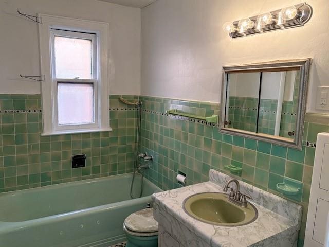 bathroom with toilet, a tub, walk in shower, vanity, and tile walls