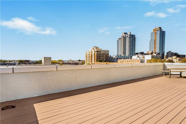 207 Bay 35th St Unit 2B, Brooklyn, NY 11214 - wooden deck featuring a view of city