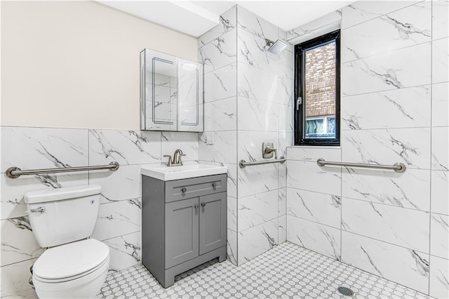 207 Bay 35th St Unit 2B, Brooklyn, NY 11214 - bathroom featuring tile walls, vanity, tiled shower, and toilet