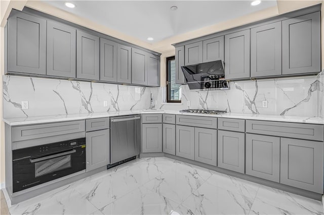 207 Bay 35th St Unit 2B, Brooklyn, NY 11214 - kitchen with gray cabinets, stainless steel appliances, recessed lighting, tasteful backsplash, and extractor fan