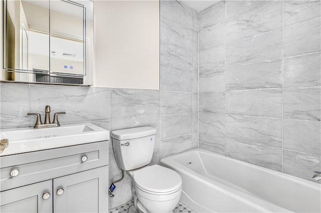 207 Bay 35th St Unit 2B, Brooklyn, NY 11214 - bathroom featuring tile walls, toilet, and vanity