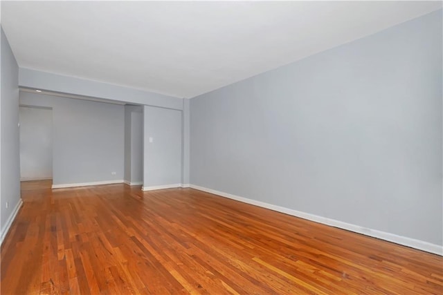 2331 Ocean Ave Unit 6C, Brooklyn, NY 11229 - unfurnished room with wood finished floors and baseboards