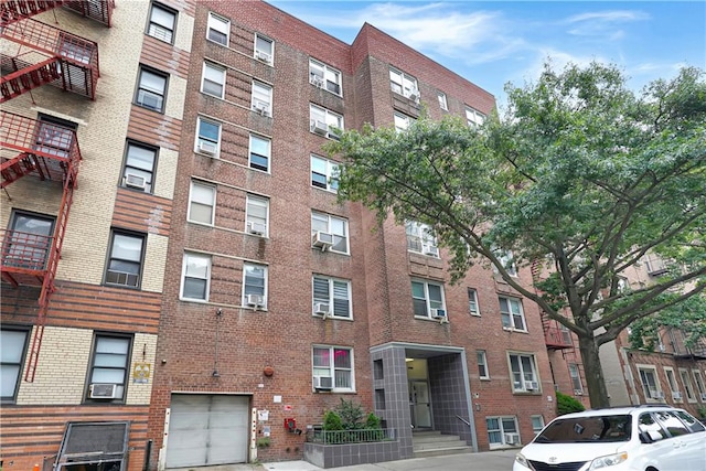 2331 Ocean Ave Unit 6C, Brooklyn, NY 11229 - view of apartment building / complex featuring cooling unit and a garage