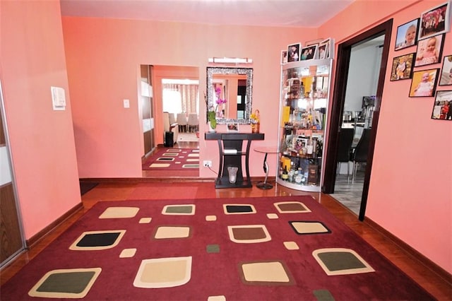 hallway featuring baseboards