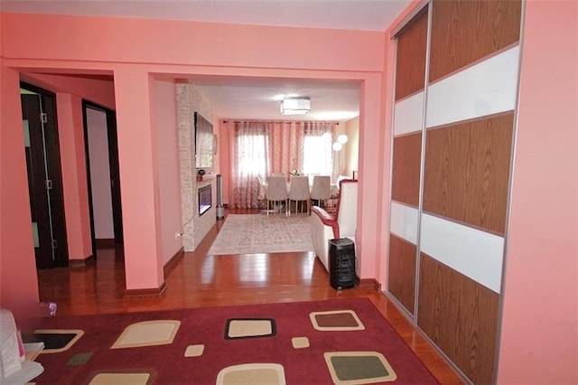 hallway with wood finished floors