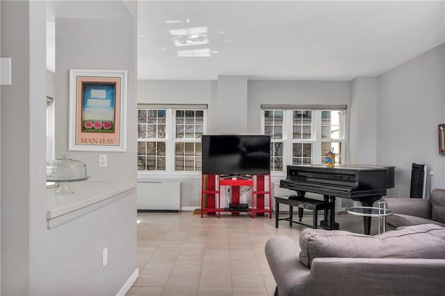 living area with light tile patterned floors