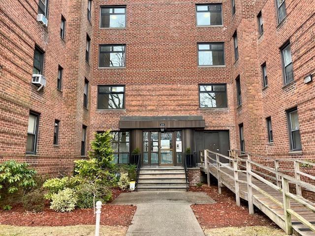 2270 Plumb 1st St Unit 4F, Brooklyn, NY 11229 - view of building exterior with cooling unit