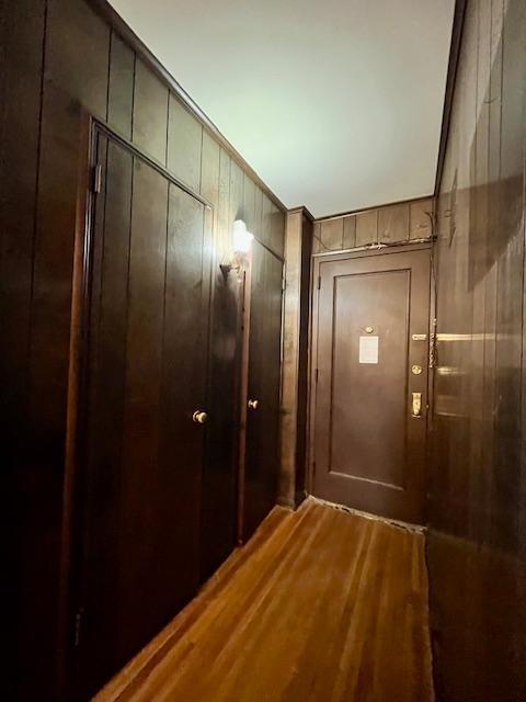 2270 Plumb 1st St Unit 4F, Brooklyn, NY 11229 - interior space with wood walls and wood finished floors