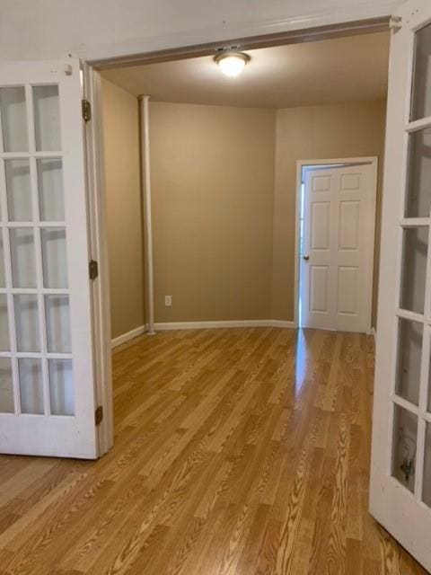 empty room featuring wood-type flooring