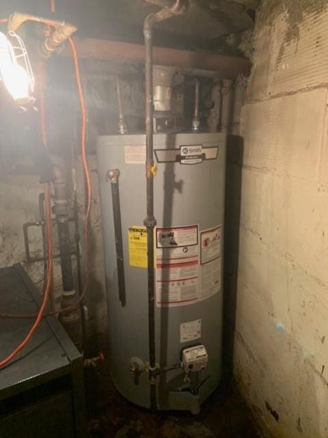 utility room with water heater