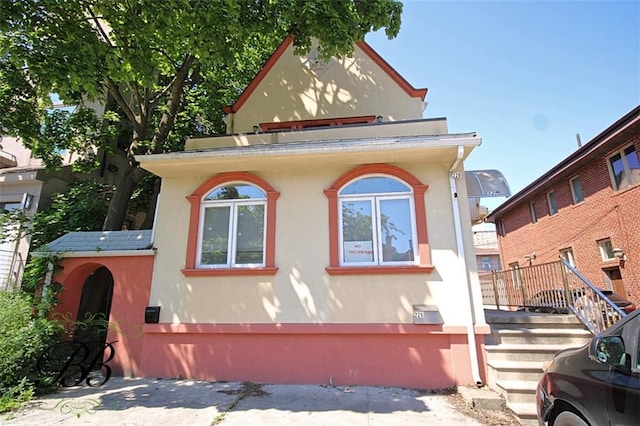 226 W End Ave, New York, NY 11235 - view of front of house featuring stucco siding
