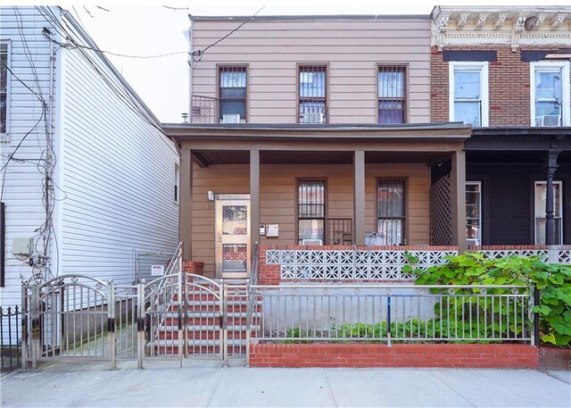 view of front of home featuring covered porch