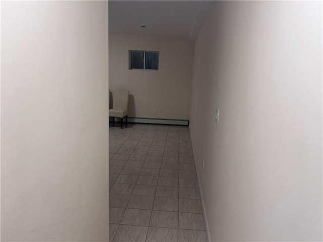 1171 86th St Unit 1B, Brooklyn, NY 11228 - hallway with a baseboard heating unit and light tile patterned floors