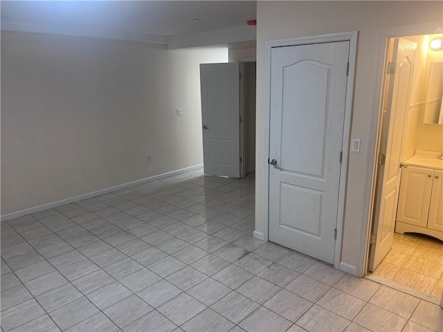 1171 86th St Unit 1B, Brooklyn, NY 11228 - unfurnished room featuring light tile patterned floors and baseboards